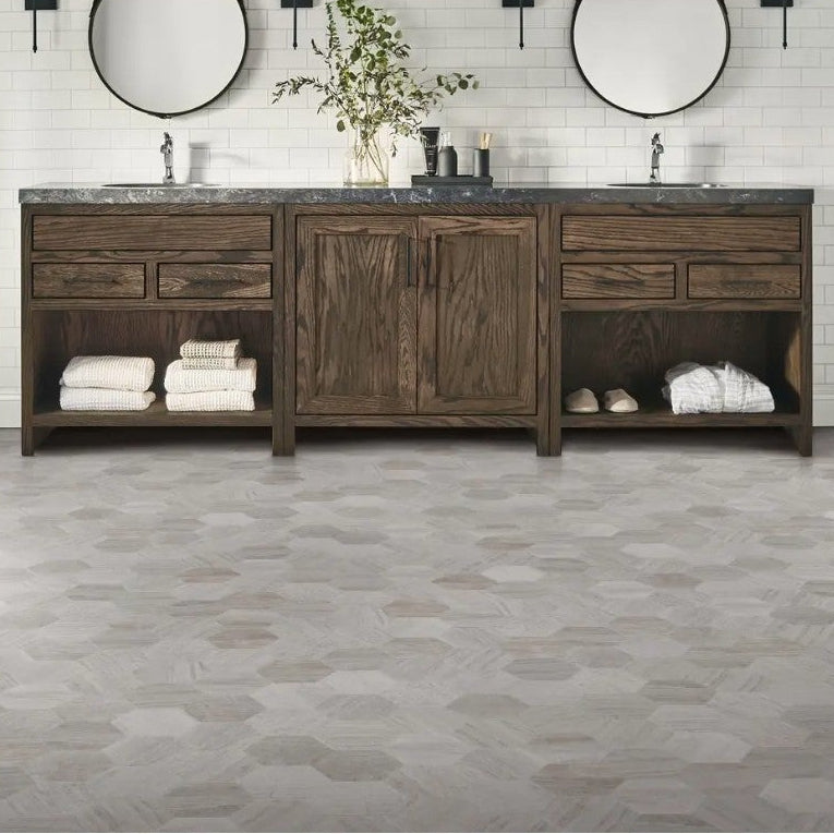 Bathroom with wooden vanity and gray flooring, featuring 'Luxury Vinyl Sheet' by Platinum. Mannington sheet vinyl Hive Pollen.