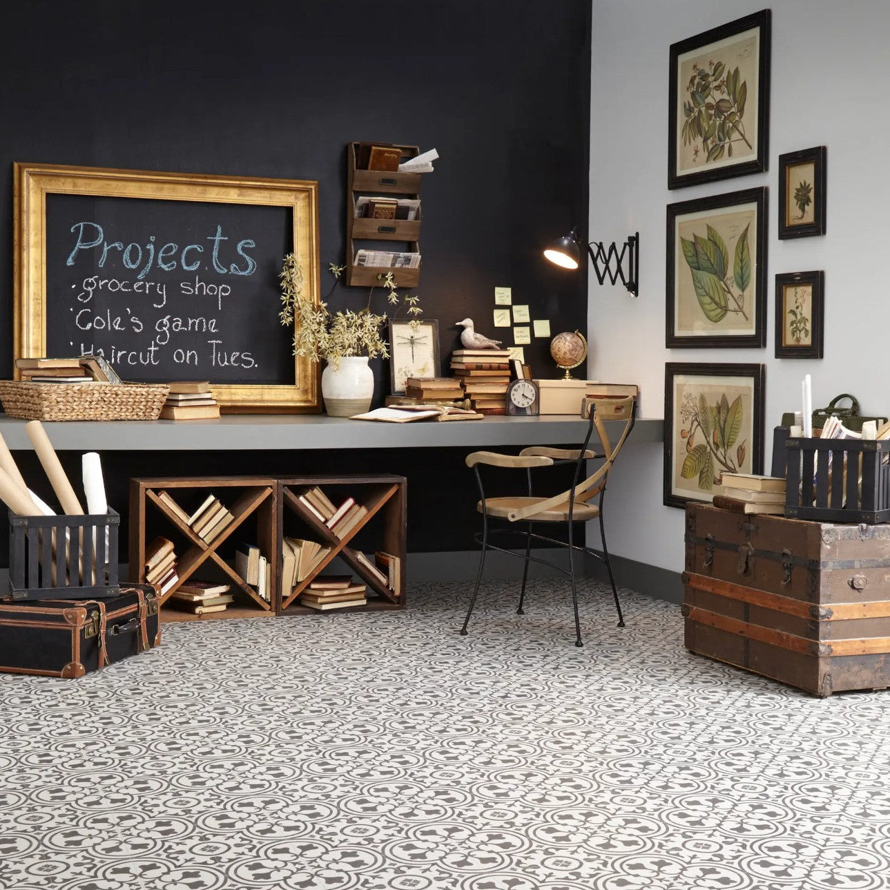 Home office with a desk, chairs, and decorative elements on a black and white patterned floor. Mannington sheet vinyl Deco Wrought Iron.