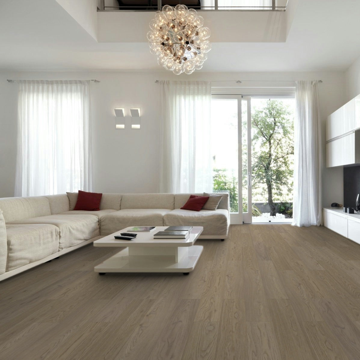 Modern living room with a chandelier, sofa, coffee table, and TV. Lakeside Park Bayside laminate.