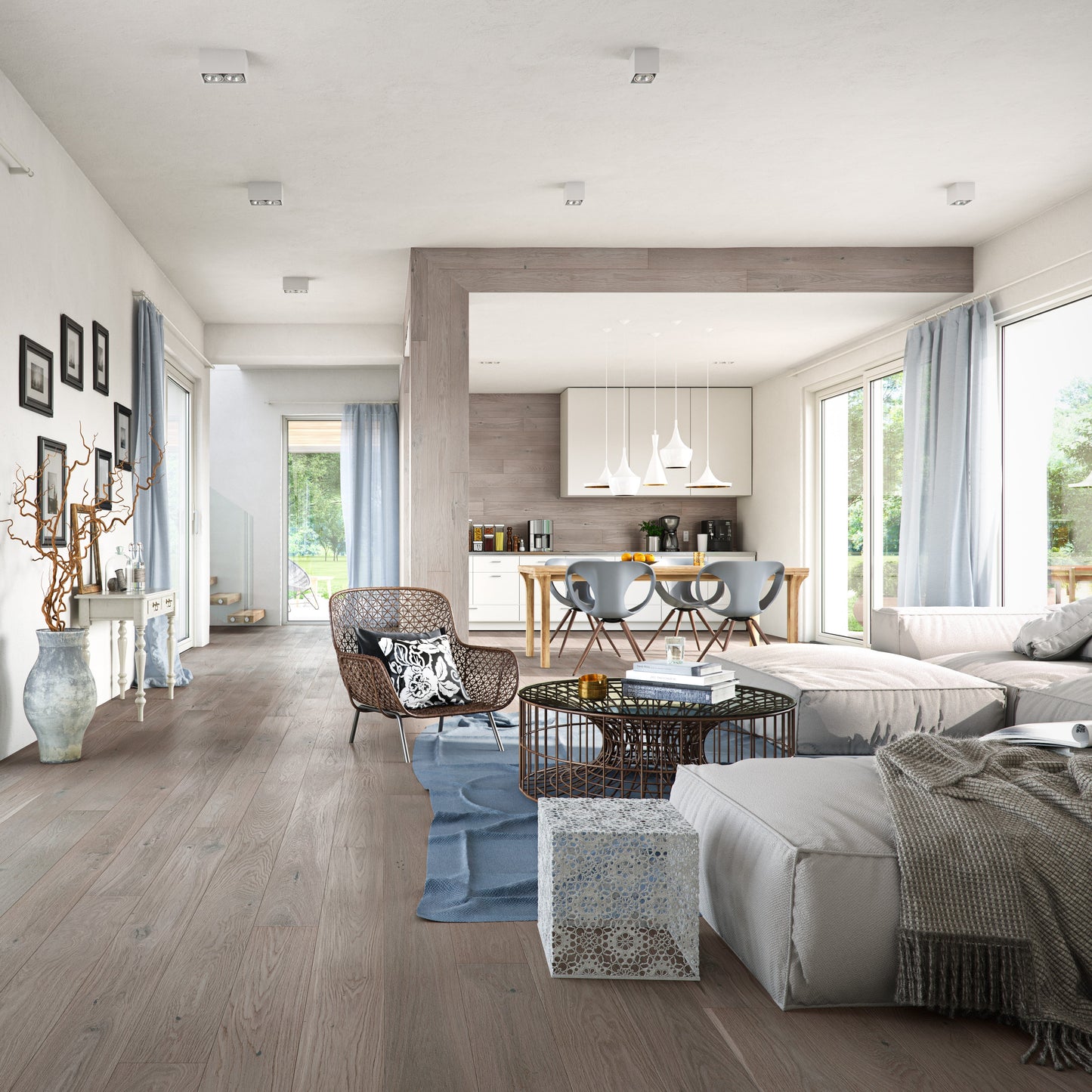 Modern living room with gray sofa, coffee table, and decorative items. Millcreek Organza hardwood flooring.