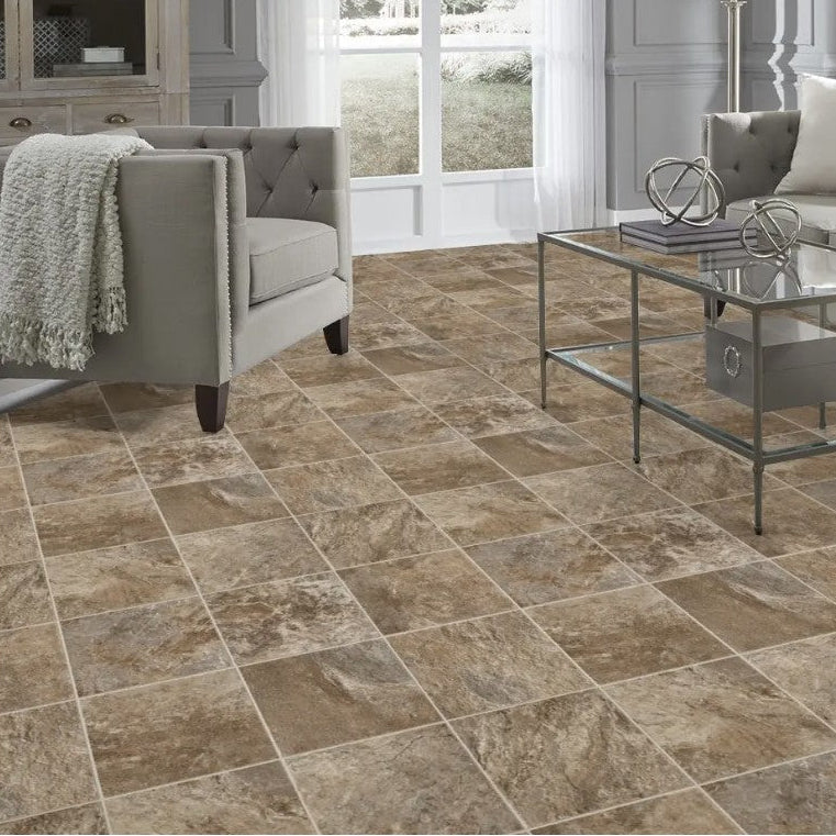 Living room with gray sofa and coffee table on a tiled floor, surrounded by smaller images of tiles.