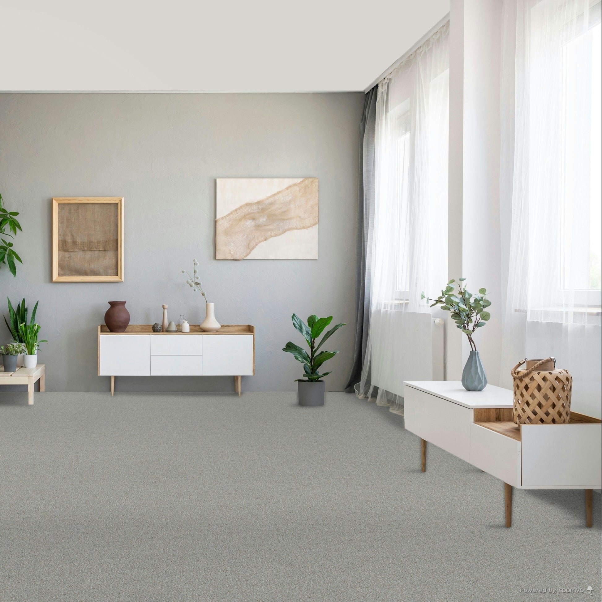 Modern living room with gray carpet, furniture, and decorative elements. Spartacus Overcast carpet.